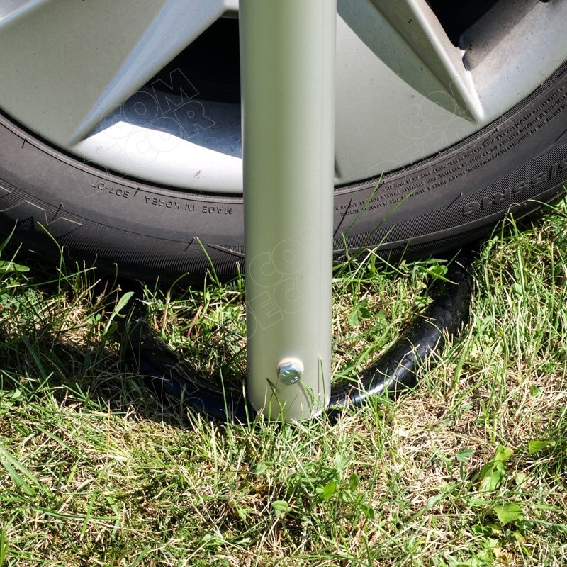 Flag base which fits under a car tire